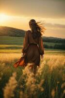 people spent time in grass field at sunset photo