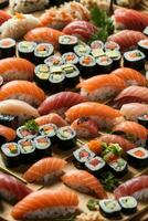 delicious sushi on wooden plate photo