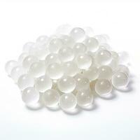 Jelly beads small pile translucent milky white on white background generative AI photo