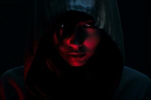 a woman in a hoodie with red light on her face generative ai photo