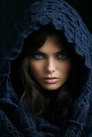 un hermosa mujer con azul ojos en un azul de punto capucha generativo ai foto