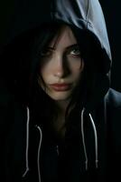 a woman with a hoodie on in the dark generative ai photo