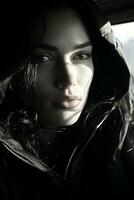 black and white portrait of a woman in a hoodie generative ai photo