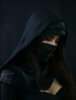 an arab woman wearing a black veil generative ai photo