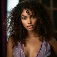 beautiful african american woman with curly hair photo