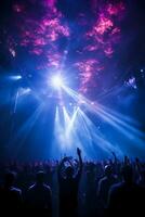 Stage lighting shining down from the top, many people holding their mobile phone flash, dancing in blue and purple. AI generative photo