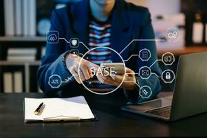 SASE Secure Access Service Edge concept Hand touching Secure Access Service Edge icon on virtual screen background, password, network, framework and support technology in office photo