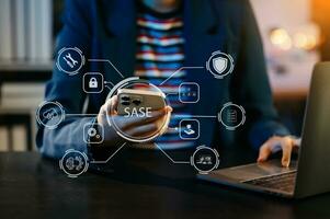 SASE Secure Access Service Edge concept Hand touching Secure Access Service Edge icon on virtual screen background, password, network, framework and support technology in office photo