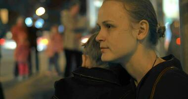 Mother comforting a child in the street video