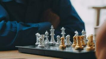 Pensioners pastime at senior home. Aged couple playing chess. Activities for seniors, elderly active lifestyle, older people time spending concept video