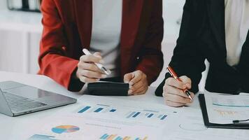Team of business people working together in the meeting room office, teamwork background charts and graphs banner, double exposure successful teamwork,business planning concept. video
