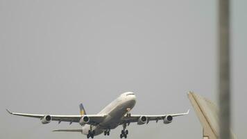 FRANKFURT AM MAIN, GERMANY JULY 19, 2017 - Lufthansa Airbus 340 D AIGT take off and climb at runway 25C. Fraport, Frankfurt, Germany video