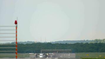 Turboprop airplane braking after landing in Dusseldorf Airport video