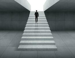 Ambitious concept with businessman climbing stairs photo