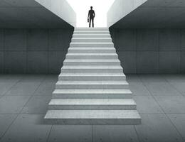 businessman at top of stairs. concept ambition and successful business photo