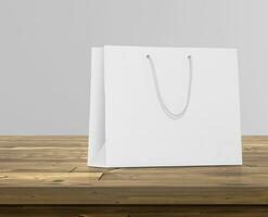 Empty shopping bags on wooden floor for advertising photo