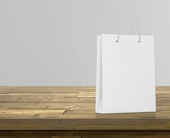 Empty shopping bags on wooden floor for advertising photo