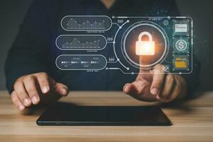 Businessman touch a virtual screen to unlock and access information and document, Protection network security computer and safe data, cybersecurity concept, user privacy security and encryption photo