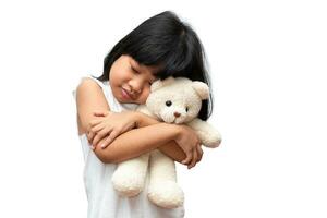 Portrait of happy and funny Asian child girl on white background, a child looking at camera. Preschool kid dreaming fill with energy feeling healthy and good concept photo