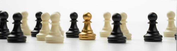 Golden Chess pawn standing to Be around of other chess, Concept of a leader must have courage and challenge in the competition, leadership and business vision for a win in business games photo