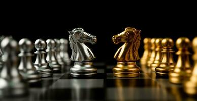 Golden and silver horse chess pieces Invite face to face and There are chess pieces in the background. Concept of competing, leadership and business vision for a win in business games photo