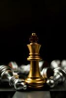 Golden King chess is last standing in the chess board, Concept of successful business leadership photo