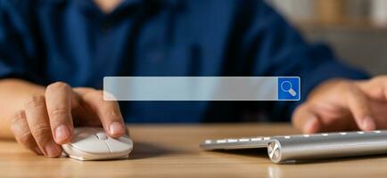 Businessman using a keyboard and notebook for searching information on the internet, searching browsing internet bar, Concept of Searching Browsing Internet Data Information Networking photo