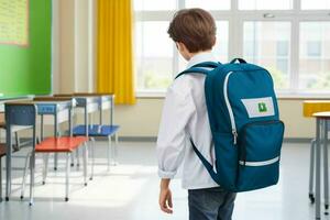 Back view of a schoolboy with a backpack standing in the classroom. Generative Ai Pro Photo