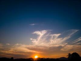 The sun and beautiful evening sky are suitable for the background photo