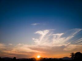 The sun and beautiful evening sky are suitable for the background photo