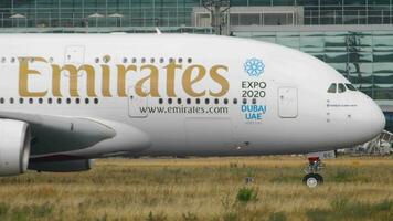 FRANKFURT AM MAIN, GERMANY JULY 17, 2017 - Airbus 380 Emirates A6 EOC taxiing after landing. Fraport, Frankfurt, Germany video