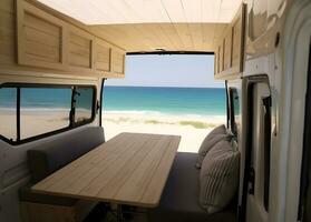 Beach scene seen by camper inside camper van photo