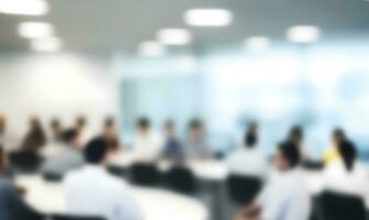 Blurred background of businesspeople at meeting. photo