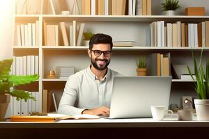 Handsome man working with a laptop. Author, freelancer, learner or work from home concept. photo