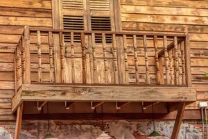 Ancient wooden house balcony photo