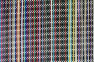 The wicker surface is made with colorful patterns. photo