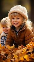 Adorable children playing in piles of autumn leaves photo