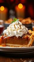 Plate of delicious pumpkin pie with whipped cream photo