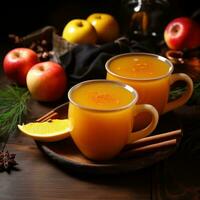 Warm apple cider served in cozy mugs photo