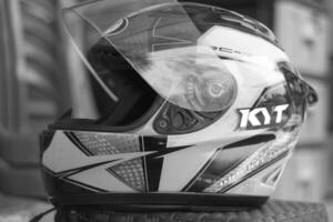 Magelang, Indonesia.09 28 2023-The KYT brand full face helmet is widely used in Indonesia because of its cheap price and quality photo