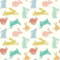 Seamless pattern with rabbits on pastel background. Bunny spring pattern. Vector illustration for banner, textiles, wallpapers.