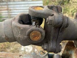 old rusty metal pipe with the valve photo