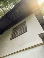 window on the roof of the home in country Thailand photo