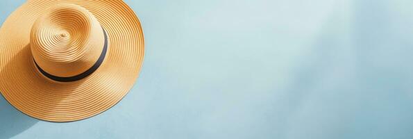 Summer background with straw hat and white sand with empty copy space photo