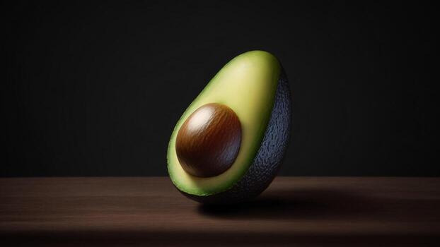 aguacate medio en de madera mesa, negro fondo, bajo luz, cerca arriba ai generado foto