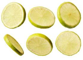 Round piece of juicy lime on a white isolated background photo
