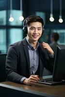 Portrait of a Handsome Asian Man, Customer Service Operator, Call Center Worker Talking Through Headset with Customer in Modern Office. photo