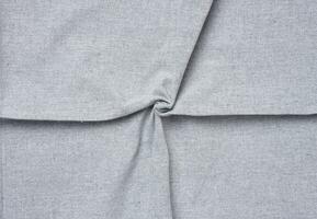 Texture of gray linen fabric, close up photo