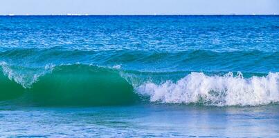 Waves at tropical beach caribbean sea clear turquoise water Mexico. photo