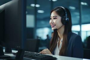 Portrait of a Beautiful Asian Customer Service Operator, Call Center Worker Talking Through Headset with Customer in Modern Office. photo
